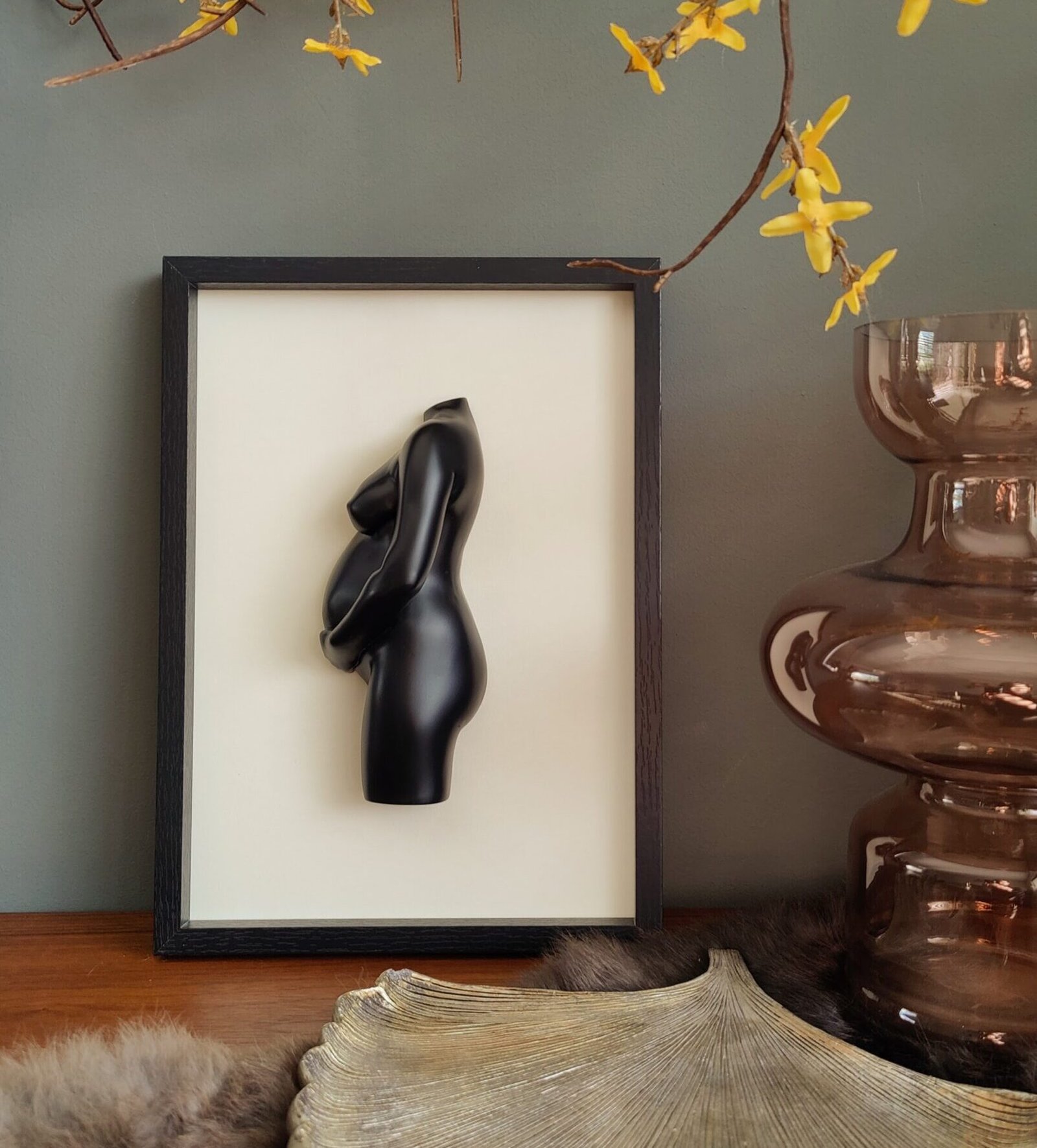 Beeldje zwanger schilderij
